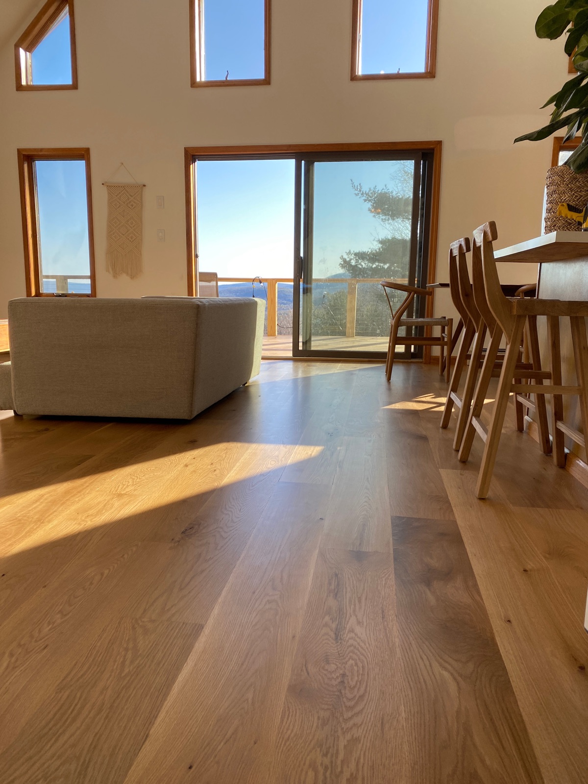 Wide plank oak in a sunlit Hudson Valley great room